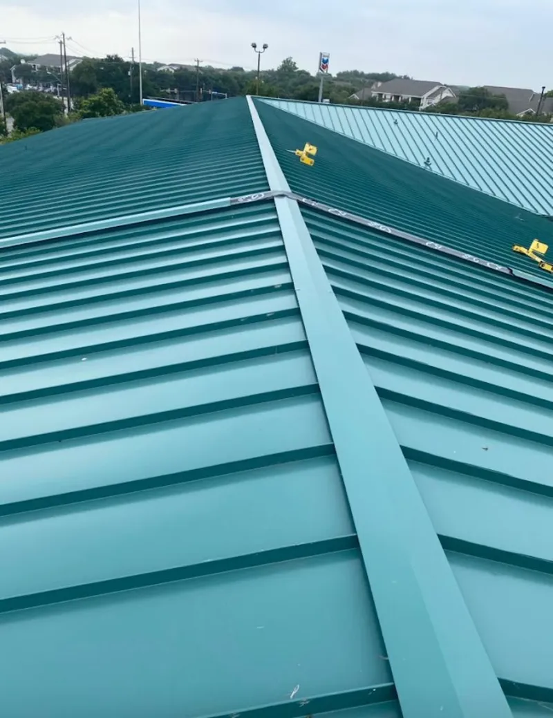 Green commercial metal roof ridge and valley for Metal Roof Repair in Scott