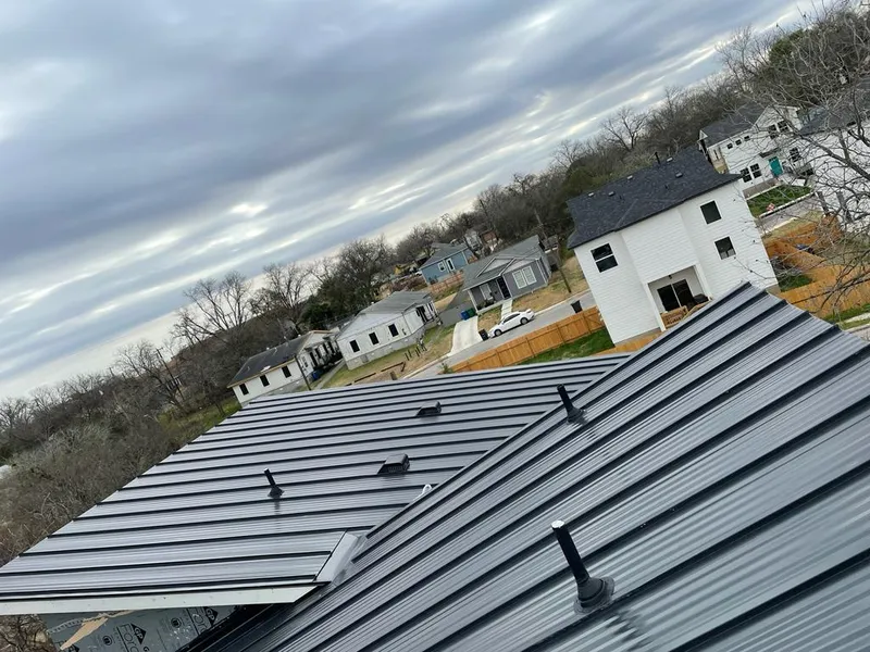 Standing seam metal roof panels with vents for Skylight Repair in Scott